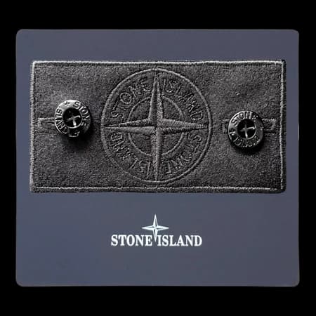 Front view of black monochrome compass design