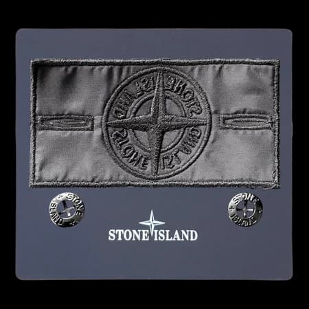 Angled view showing black badge details