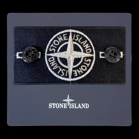 Rear view of silver badge structure